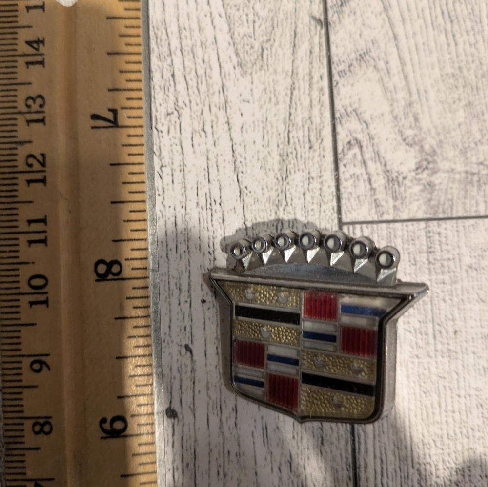 Cadillac Silver and Red Car Emblem